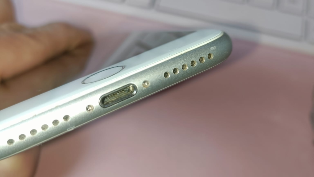 iPhone charging port with debris