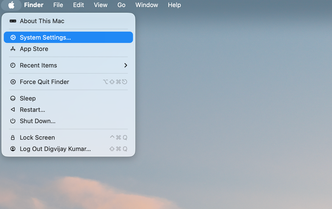 Apple menu with System Settings option selected