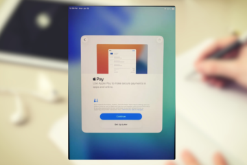 iPad Pro showing the 'Configuring Apple Pay' loading spinner during setup.