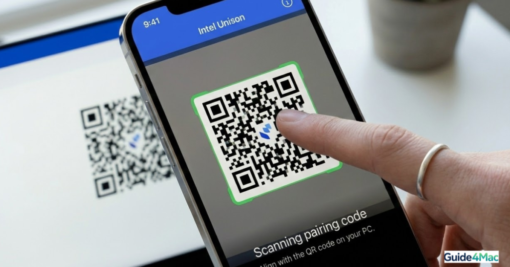 iPhone screen actively scanning an Intel Unison pairing QR code from a PC.