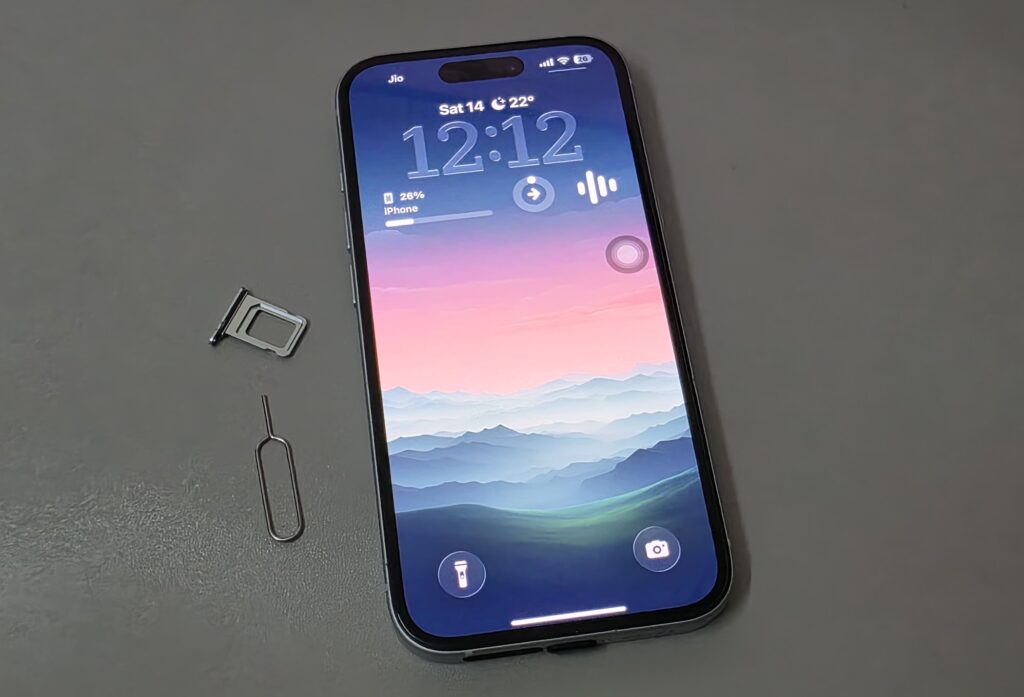 Remove the iPhone SIM tray using a SIM eject tool.