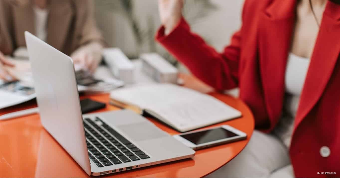 Woman working at desk with MS Office 2021 lifetime license for Mac